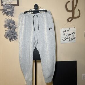 Nike Gray Sweatpants with Tapered Fit and Cuffed Ankles